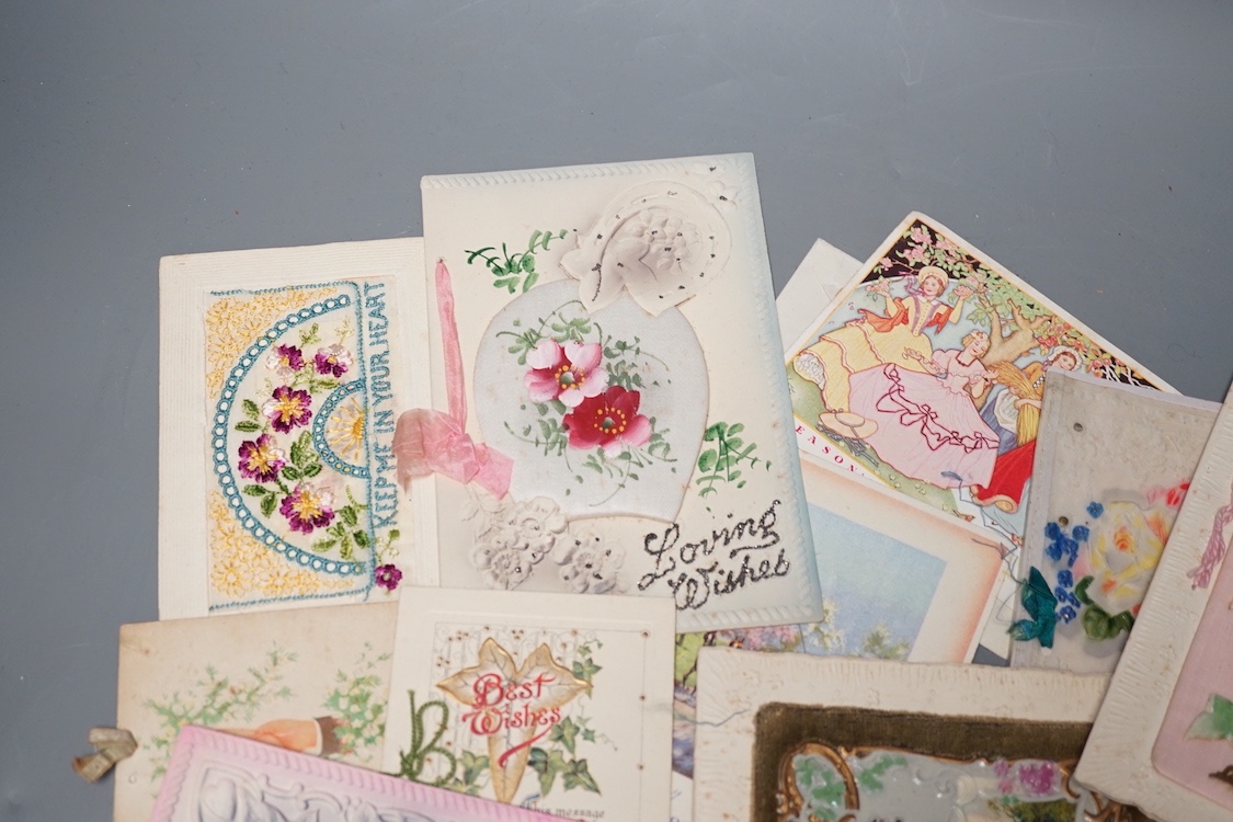 A collection of postcards and greetings cards
